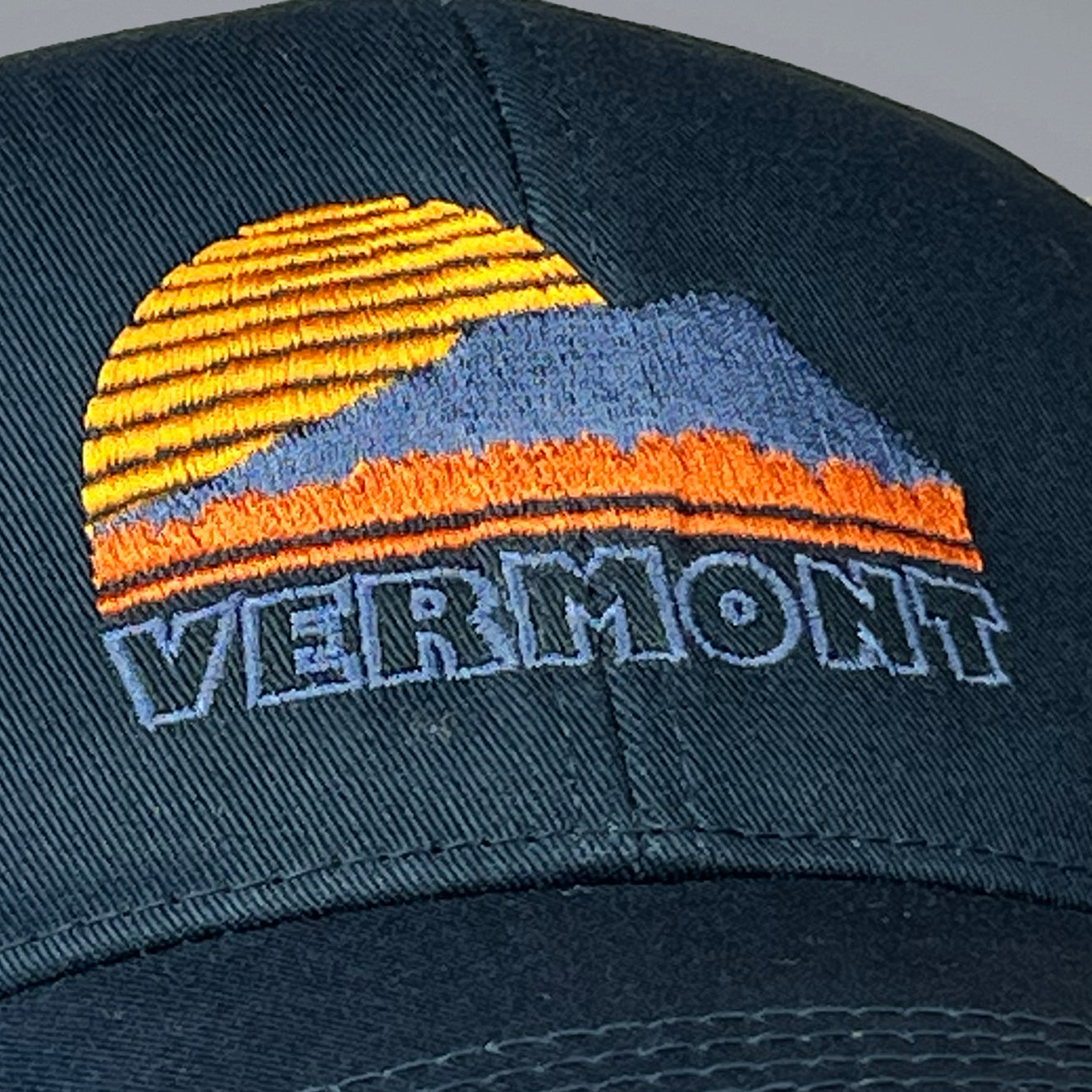Vermont Sunset trucker hat in blue.