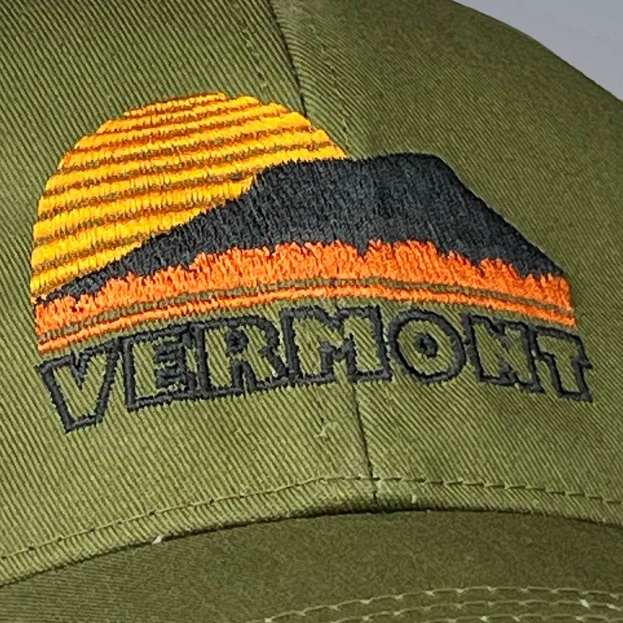 Vermont Sunset trucker hat in green.